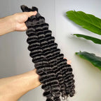 Boho curly hair, natural black color.